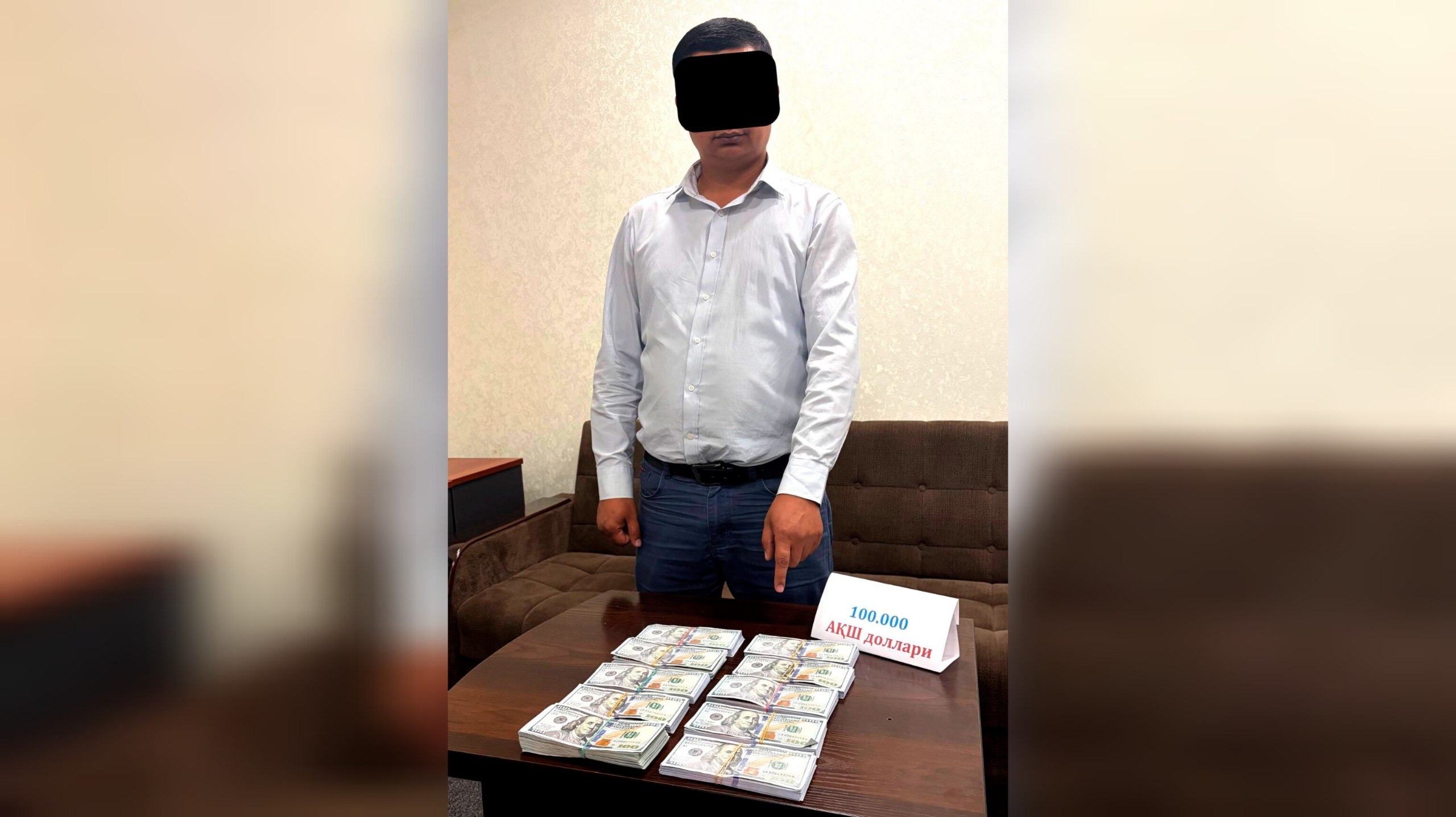 toshkent-viloyatida-bank-hodimi-100-ming-dollar-bilan-ushlandi